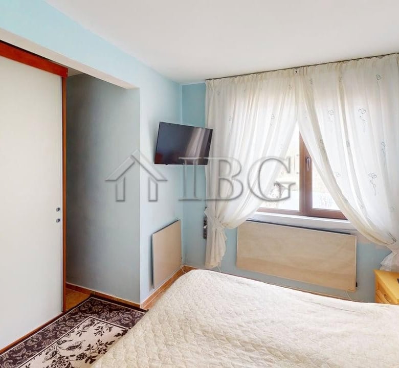 Interior view of a bedroom in a two-storey house located in a gated complex in Poroy Village.