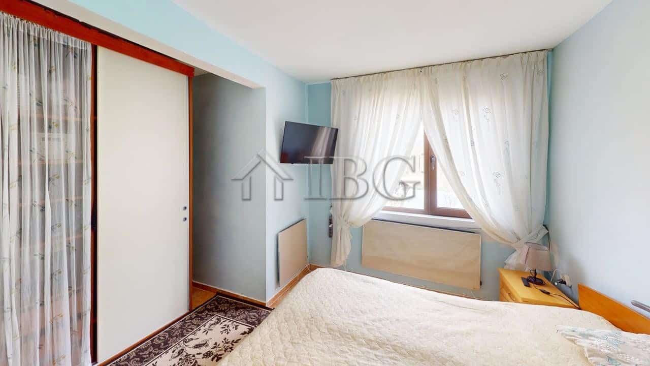 Interior view of a bedroom in a two-storey house located in a gated complex in Poroy Village.