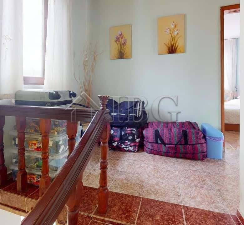Bright interior of a two-storey house in a gated complex in Poroy Village, featuring cozy living spa.