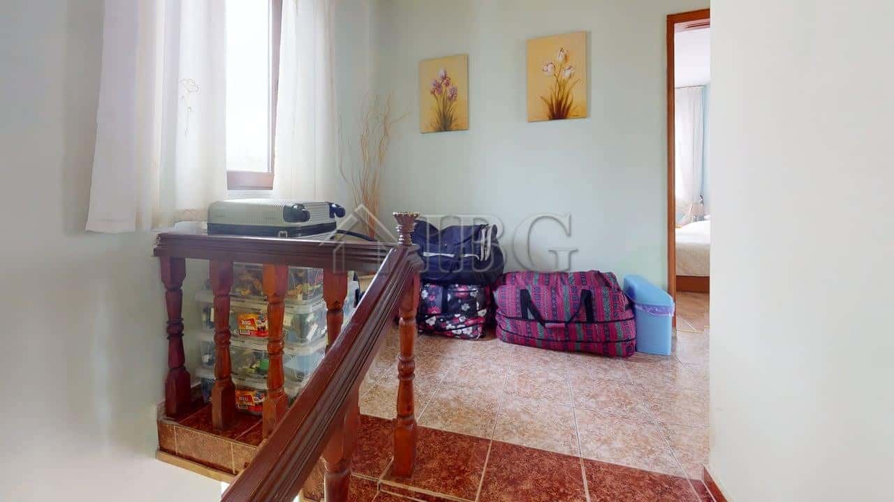 Bright interior of a two-storey house in a gated complex in Poroy Village, featuring cozy living spa.