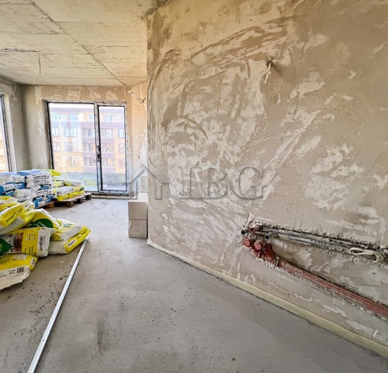 Bright interior of a new 1-bedroom apartment with large windows and lake view in Pomorie.