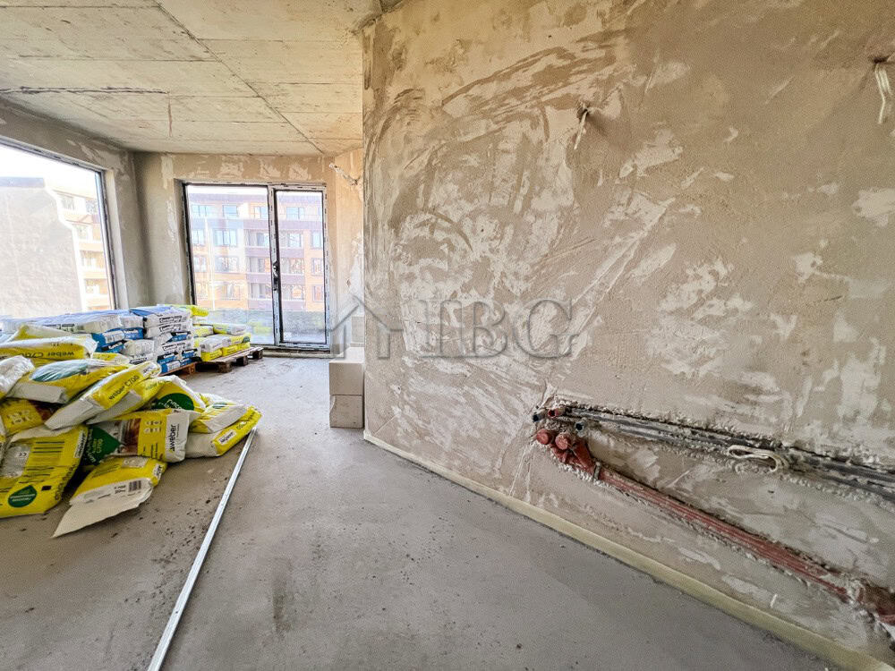 Bright interior of a new 1-bedroom apartment with large windows and lake view in Pomorie.