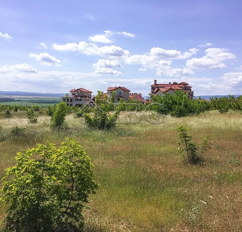 Sunny Beach plot for sale with scenic views and development potential.