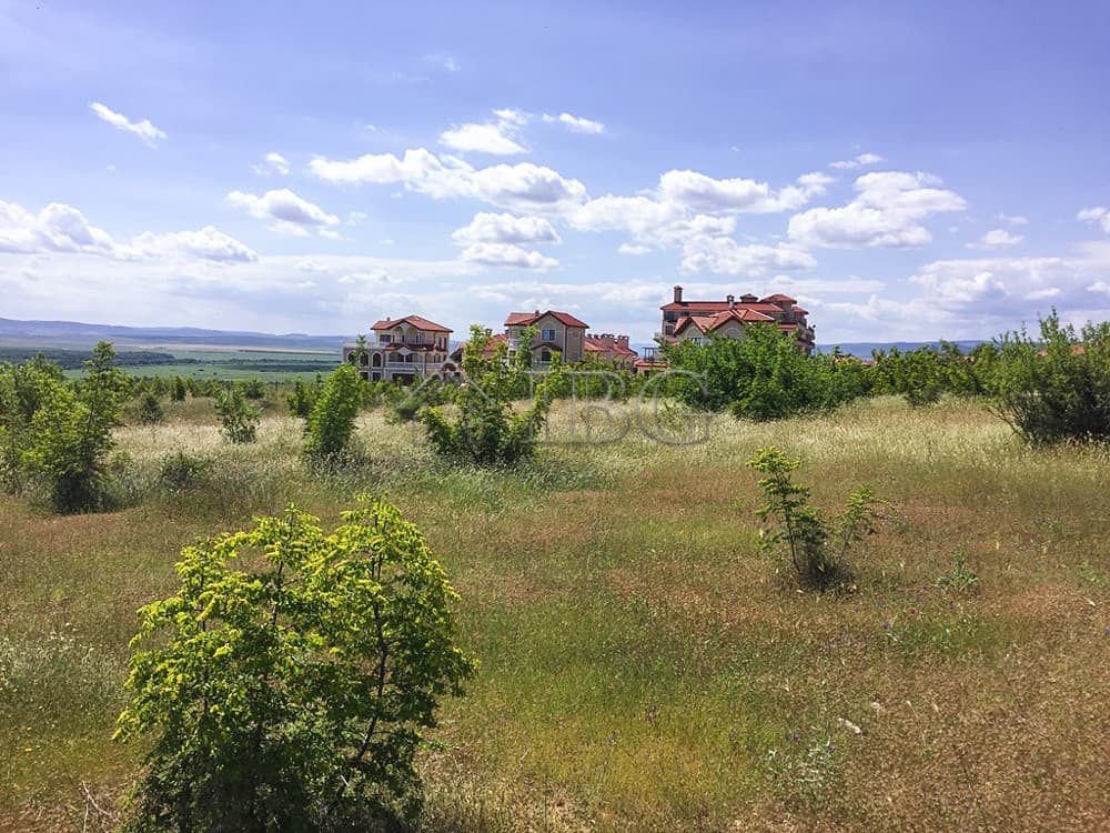 Sunny Beach plot for sale with scenic views and development potential.
