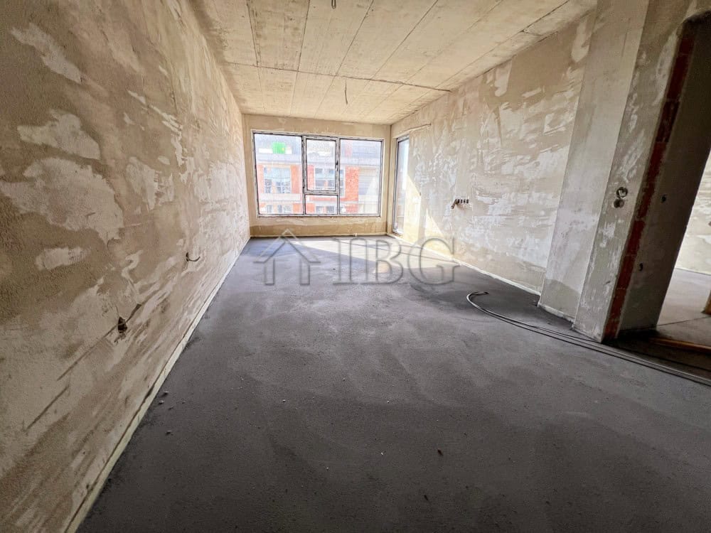 Spacious unfinished 1-bedroom apartment with large window views in Pomorie's new residential buildin.