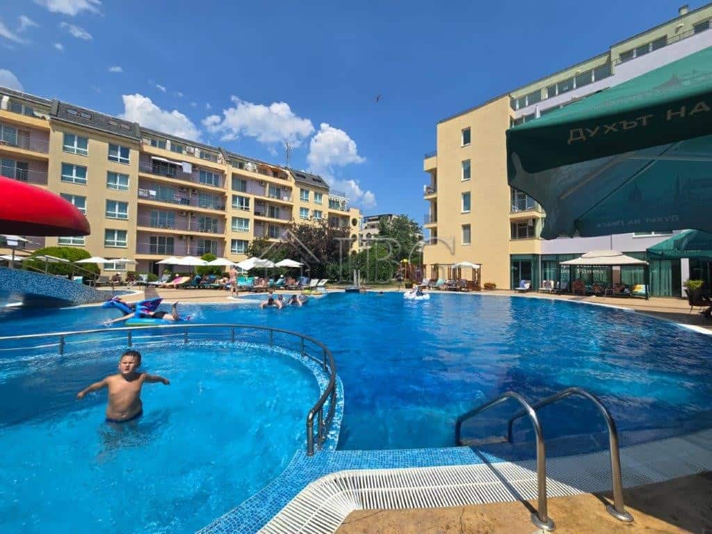 Modern pool view at Pollo Resort in Sunny Beach Pool view of the 2-room apartment at Pollo Resort, Sunny Beach, with relaxing swimming pool and sun.