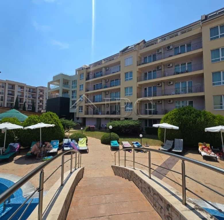 Apartment with pool view and balcony in Pollo Resort, Sunny Beach.