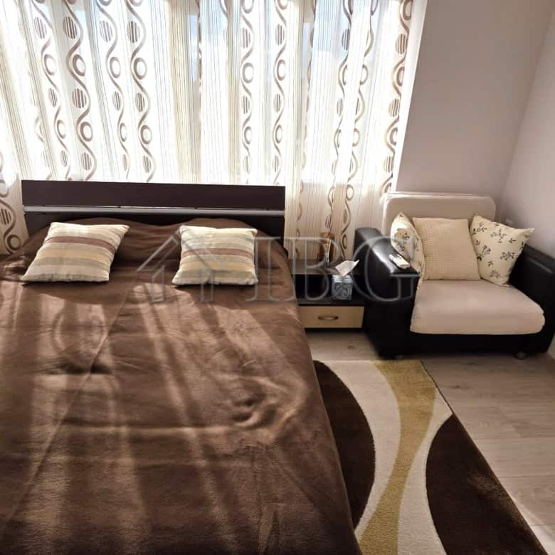 Elegant bedroom in a luxury villa at Victoria Hill, Pomorie. Modern decor with comfortable bedding a.