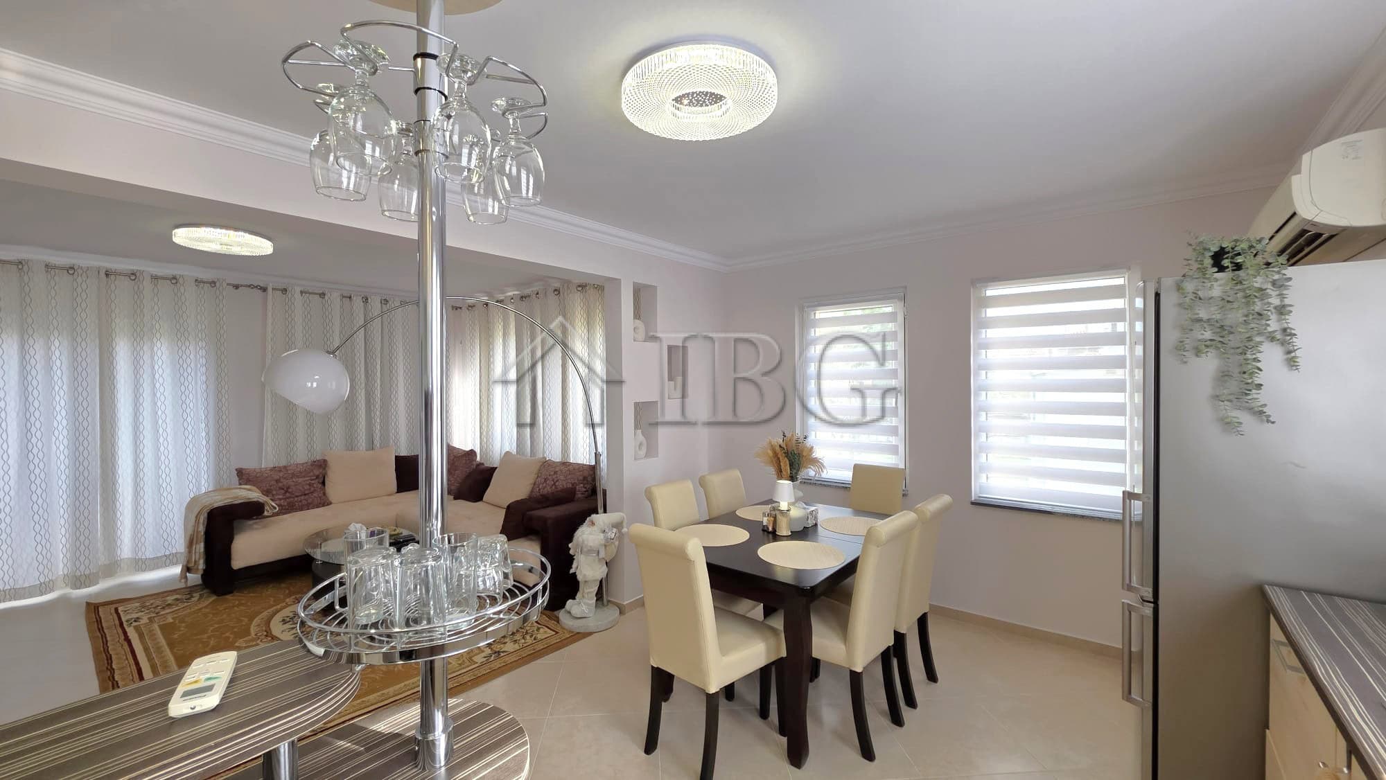 Bright and spacious living and dining area in a luxury villa at Victoria Hill, Pomorie. Modern furni.
