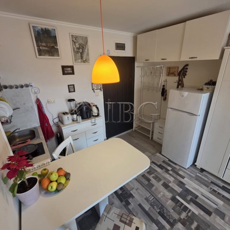 Bright interior of a studio apartment with balcony in Sveti Vlas, Bulgaria.