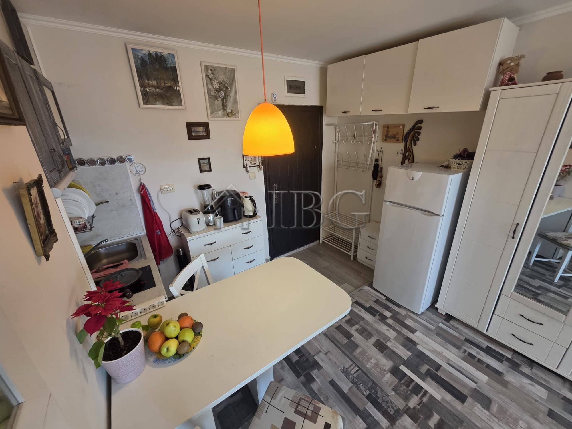 Bright interior of a studio apartment with balcony in Sveti Vlas, Bulgaria.