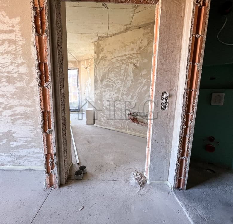 Interior view of a new 1-bedroom apartment with scenic lake view in Pomorie under construction.