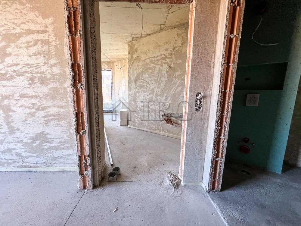 Interior view of a new 1-bedroom apartment with scenic lake view in Pomorie under construction.
