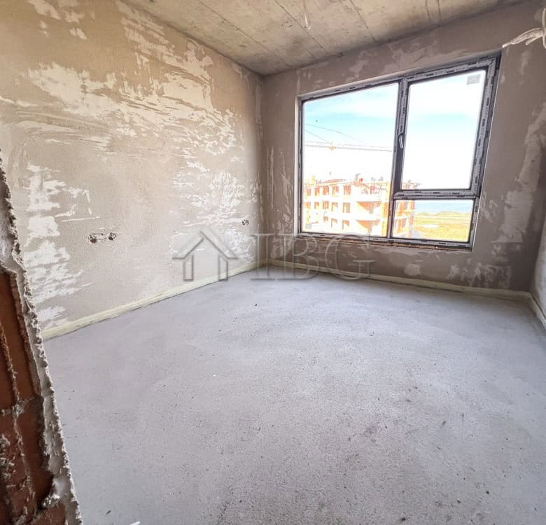 Unfinished 1-bedroom apartment with large window overlooking the lake in Pomorie.