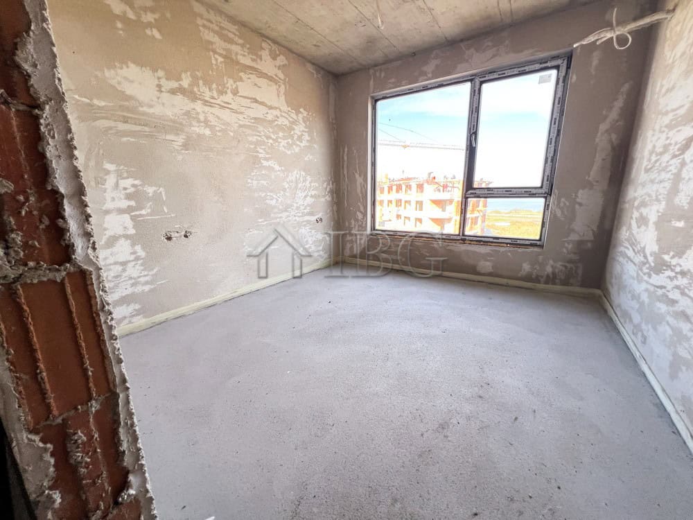Unfinished 1-bedroom apartment with large window overlooking the lake in Pomorie.
