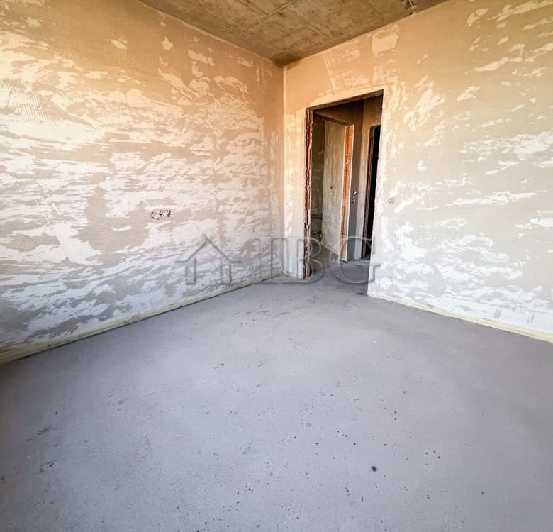 Interior view of a new 1-bedroom apartment with unfinished walls and flooring in Pomorie.