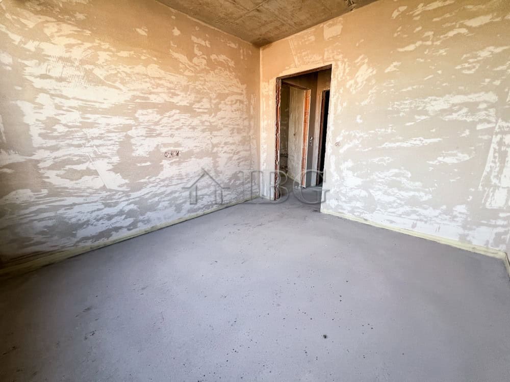 Interior view of a new 1-bedroom apartment with unfinished walls and flooring in Pomorie.
