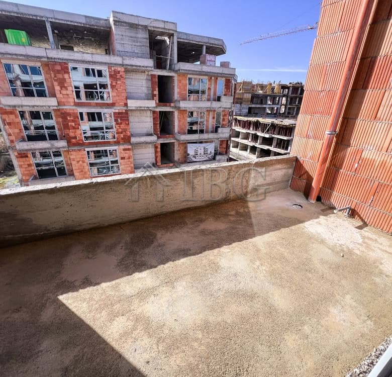 Bright outdoor balcony of a 1-bedroom apartment in Pomorie under construction.