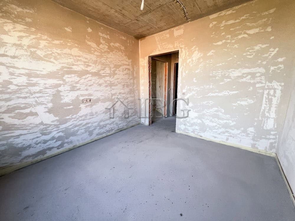 Unfinished 1-bedroom apartment with exposed walls and concrete floor in Pomorie.