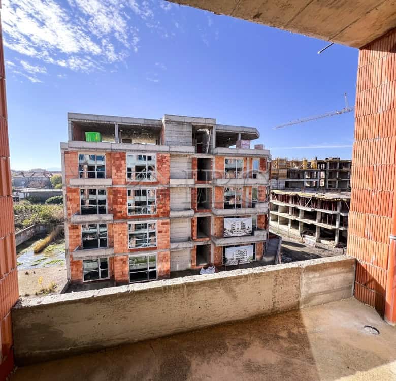Bright view from balcony of a new residential building in Pomorie under construction.