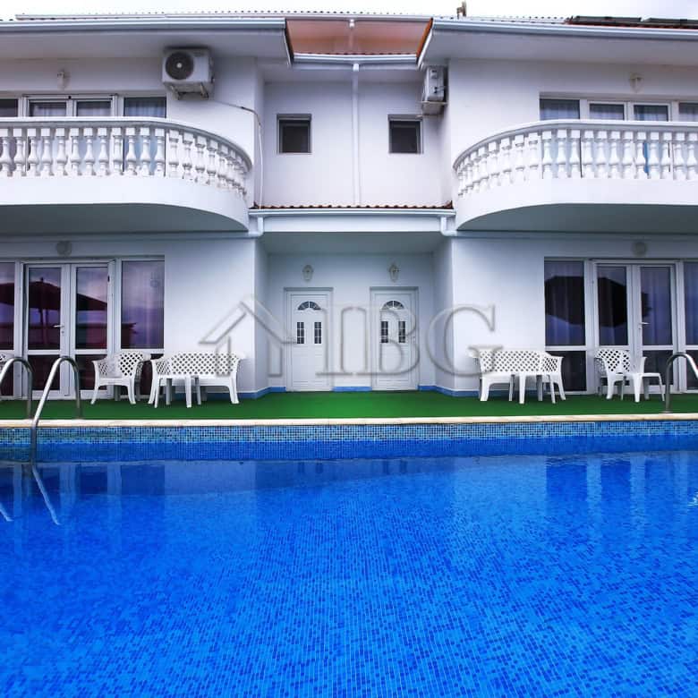 Luxury sea view villa with private pool and spacious outdoor seating in Sorrento, Italy.
