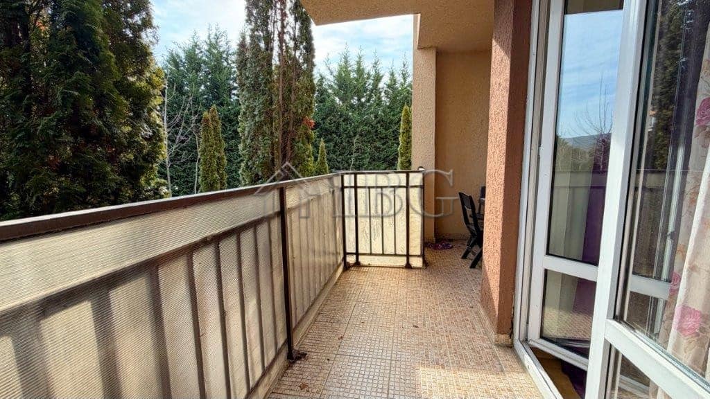 Cozy studio balcony overlooking a swimming pool at Orchid Fort Club, Sunny Beach.