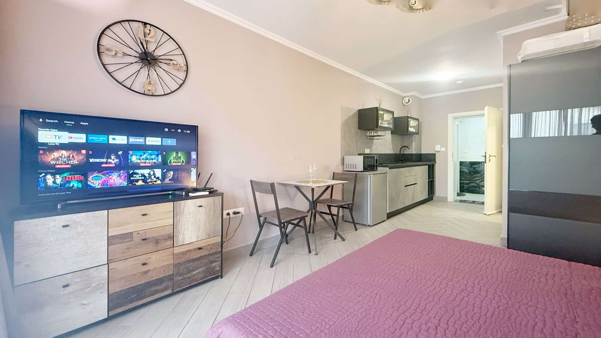 Bright studio apartment in Valencia Gardens, Nessebar, with modern furnishings and open-plan living.