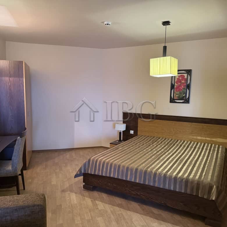 Bright studio apartment in Chairite Complex, Kosharitsa, with modern furnishings and cozy ambiance.