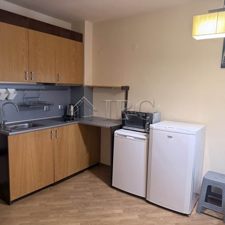 Compact studio kitchen with appliances in Chairite Complex, Kosharitsa.