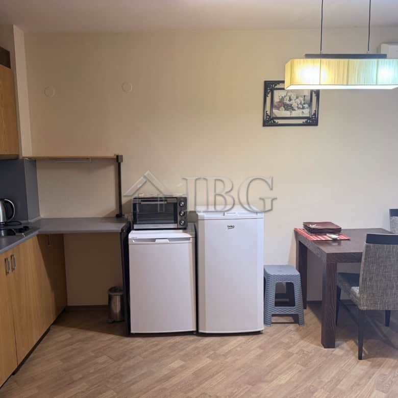 Bright studio apartment in Chairite complex, Kosharitsa, with modern kitchen and dining area. Perfec.
