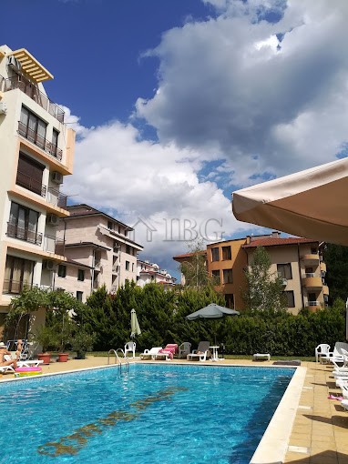 Pool view of Amber Beach Complex in Sunny Beach with modern apartments and a relaxing swimming pool.