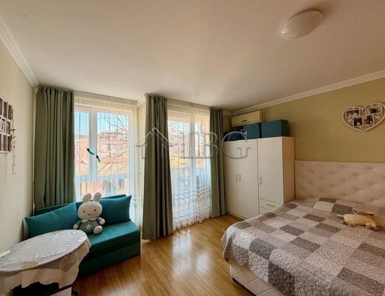 Cozy studio apartment with balcony, natural light, and modern furnishings in Melia Resort, Nessebar.