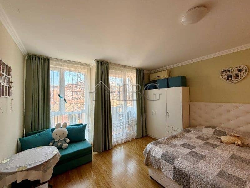 Cozy studio apartment with balcony, natural light, and modern furnishings in Melia Resort, Nessebar.