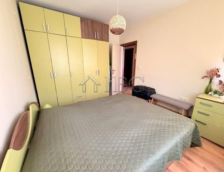 Comfortable bedroom with modern furnishings in Viola 2, Nessebar. No maintenance fee, ideal for easy.