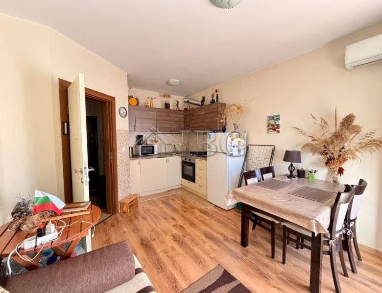 Bright interior of a one-bedroom apartment in Viola 2, Nessebar, with modern furnishings and open-pl.