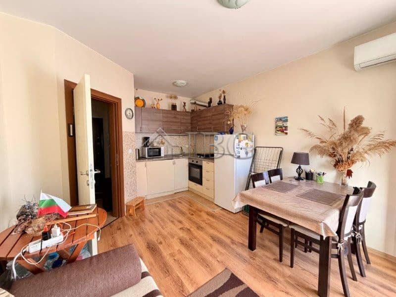 Bright interior of a one-bedroom apartment in Viola 2, Nessebar, with modern furnishings and open-pl.