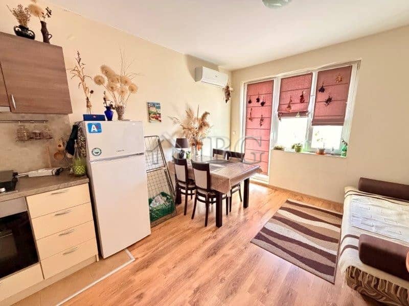 Apartment with no maintenance fee in Viola 2, Nessebar, featuring a bright living area and modern am.