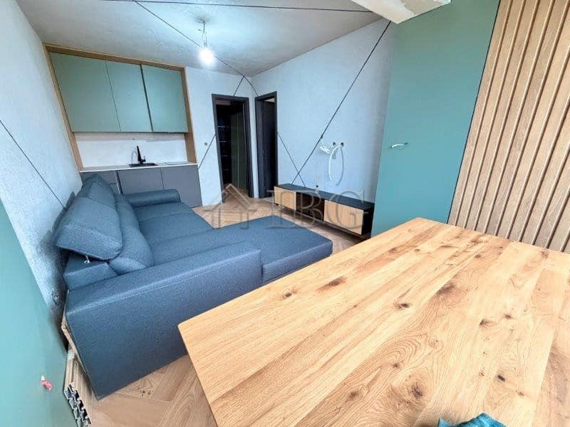 Interior view of a 1-bedroom apartment in Ravda with modern furnishings and compact living space.