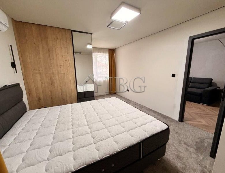 Spacious bedroom with modern furnishings and natural light in Ravda residential building. Perfect fo.
