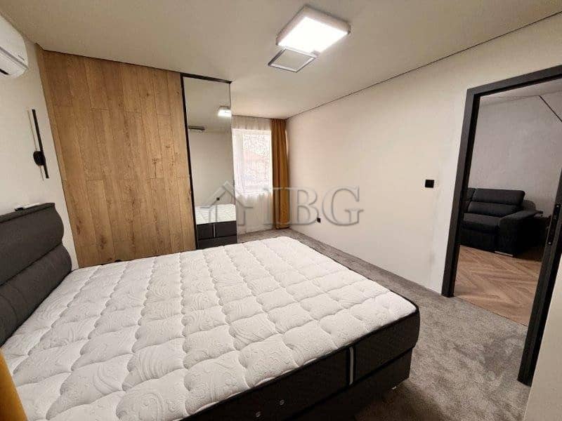 Spacious bedroom with modern furnishings and natural light in Ravda residential building. Perfect fo.