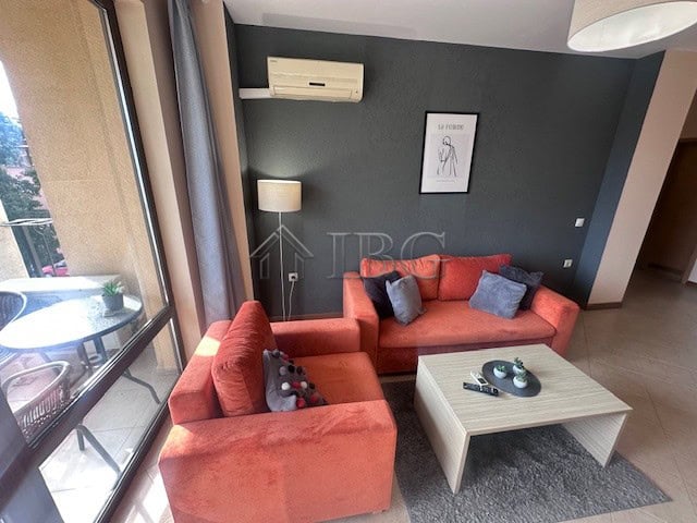 Furnished one-bedroom apartment with stylish decor and balcony views in Sunny Beach.