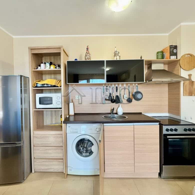 Compact kitchen with appliances in Harmony Suites 1, Sunny Beach.