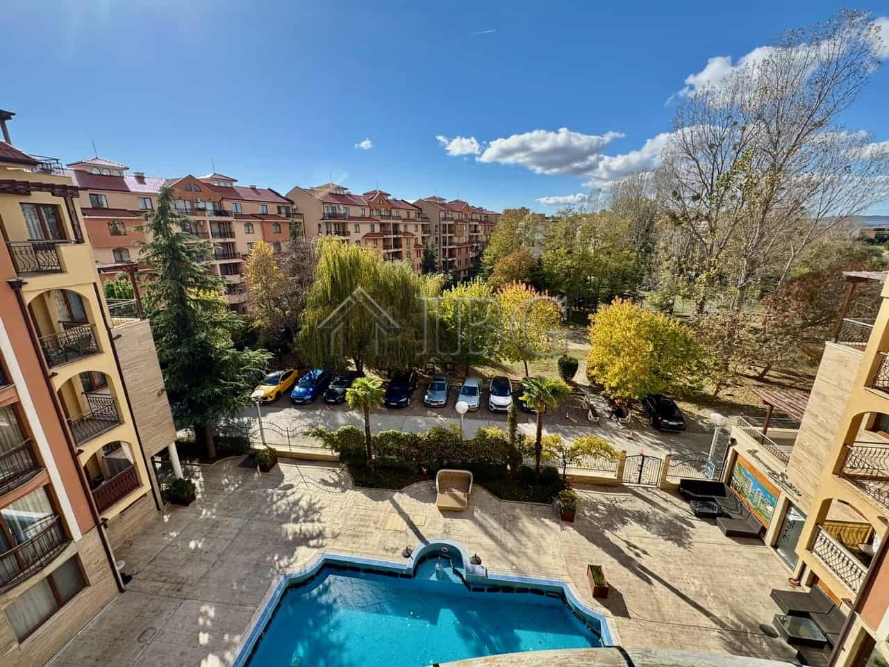 Modern apartment with pool view in Sunny Beach. Pool view from the 1-bedroom apartment at Harmony Suites 1.