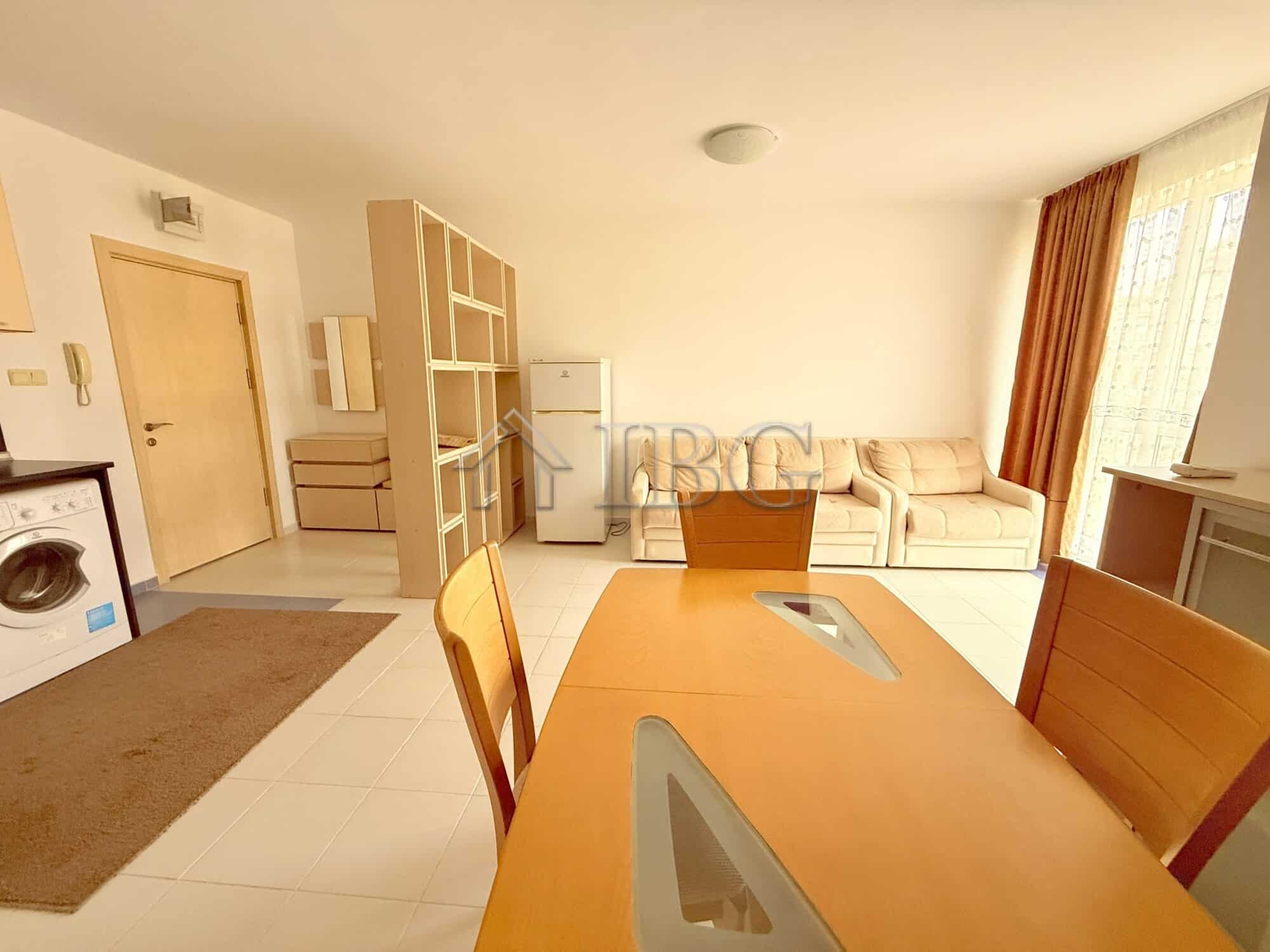 Apartment with mountain views in Sveti Vlas, Bulgaria, featuring a cozy living area and modern furni.