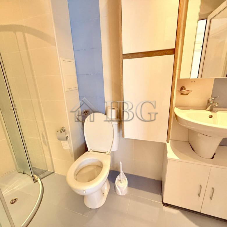 Apartment with mountain views in Sveti Vlas, Bulgaria, featuring a modern bathroom and compact livin.