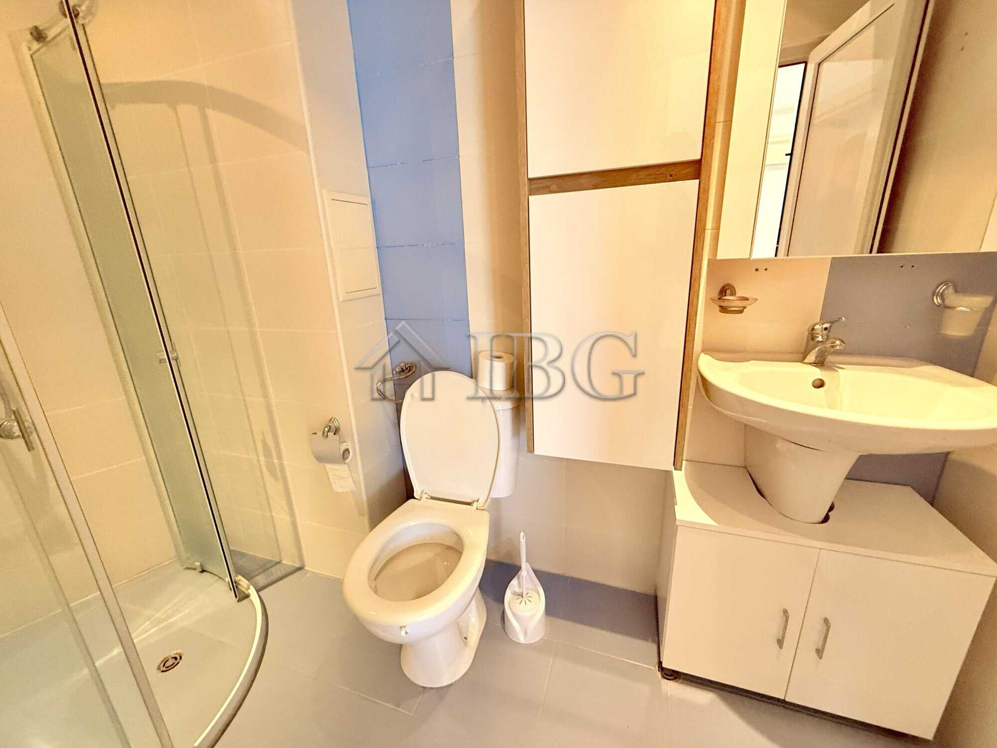 Apartment with mountain views in Sveti Vlas, Bulgaria, featuring a modern bathroom and compact livin.