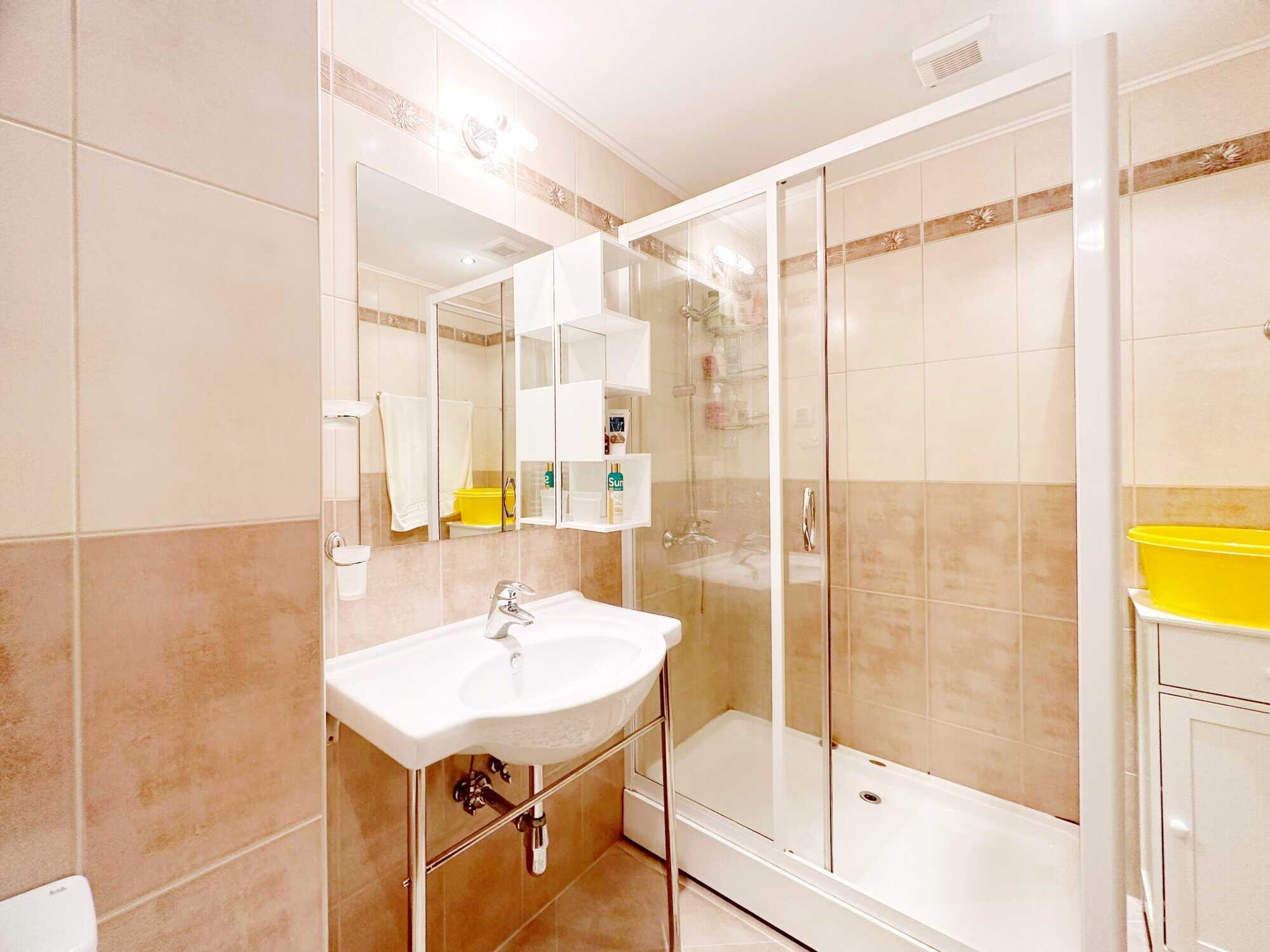 Bathroom with shower enclosure in Peter House Complex, Sunny Beach, Bulgaria.