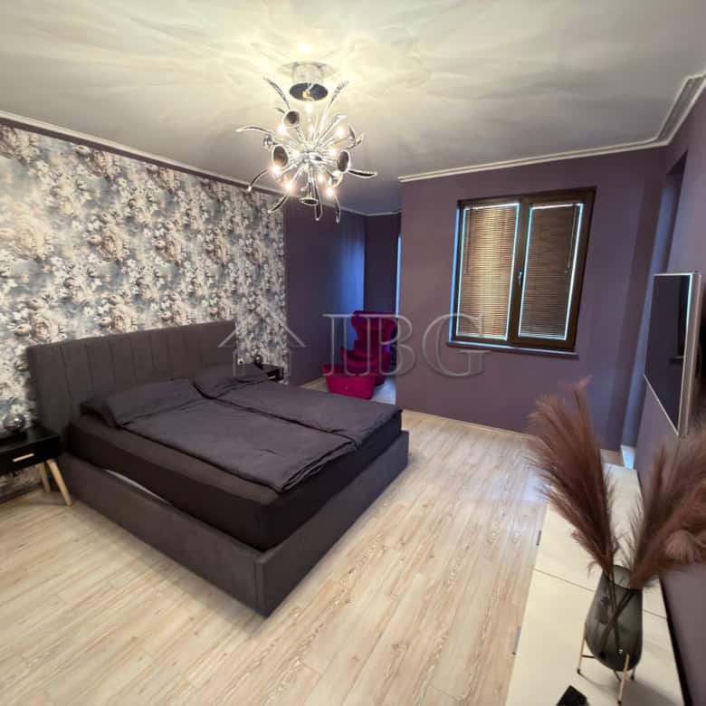 Modern bedroom with stylish decor in Nessebar. Perfect for relaxing stays in a luxury complex.