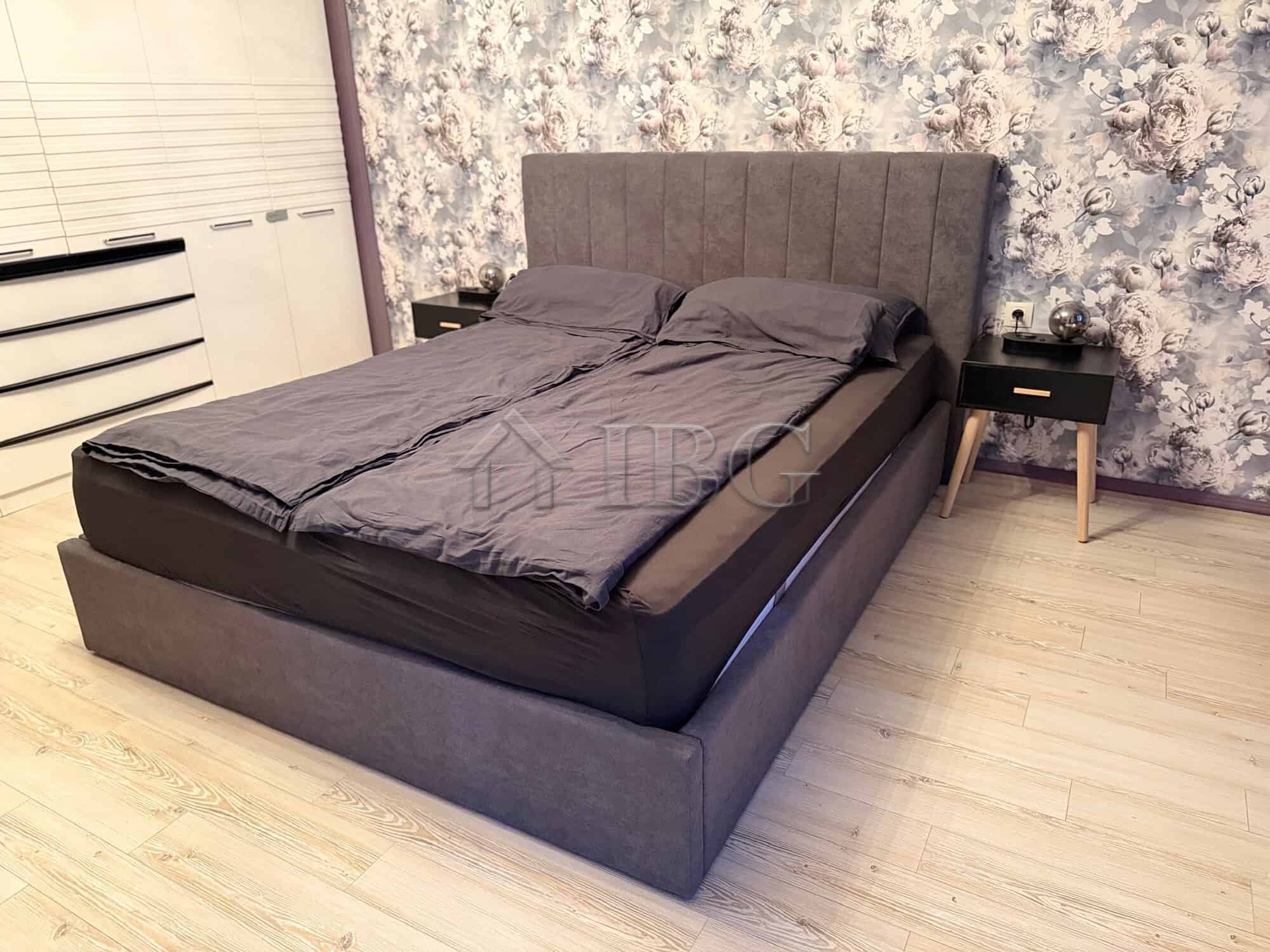 Elegant bedroom with modern decor and comfortable bedding in Nessebar.