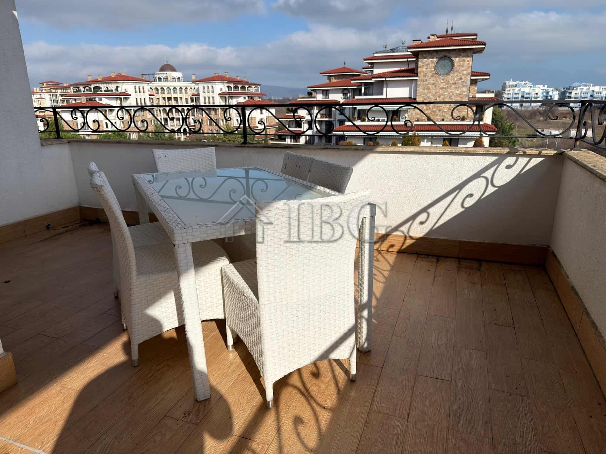 Balcony of a luxury two-bedroom apartment in Esteban SPA Complex, Nessebar, with cityscape and sceni.